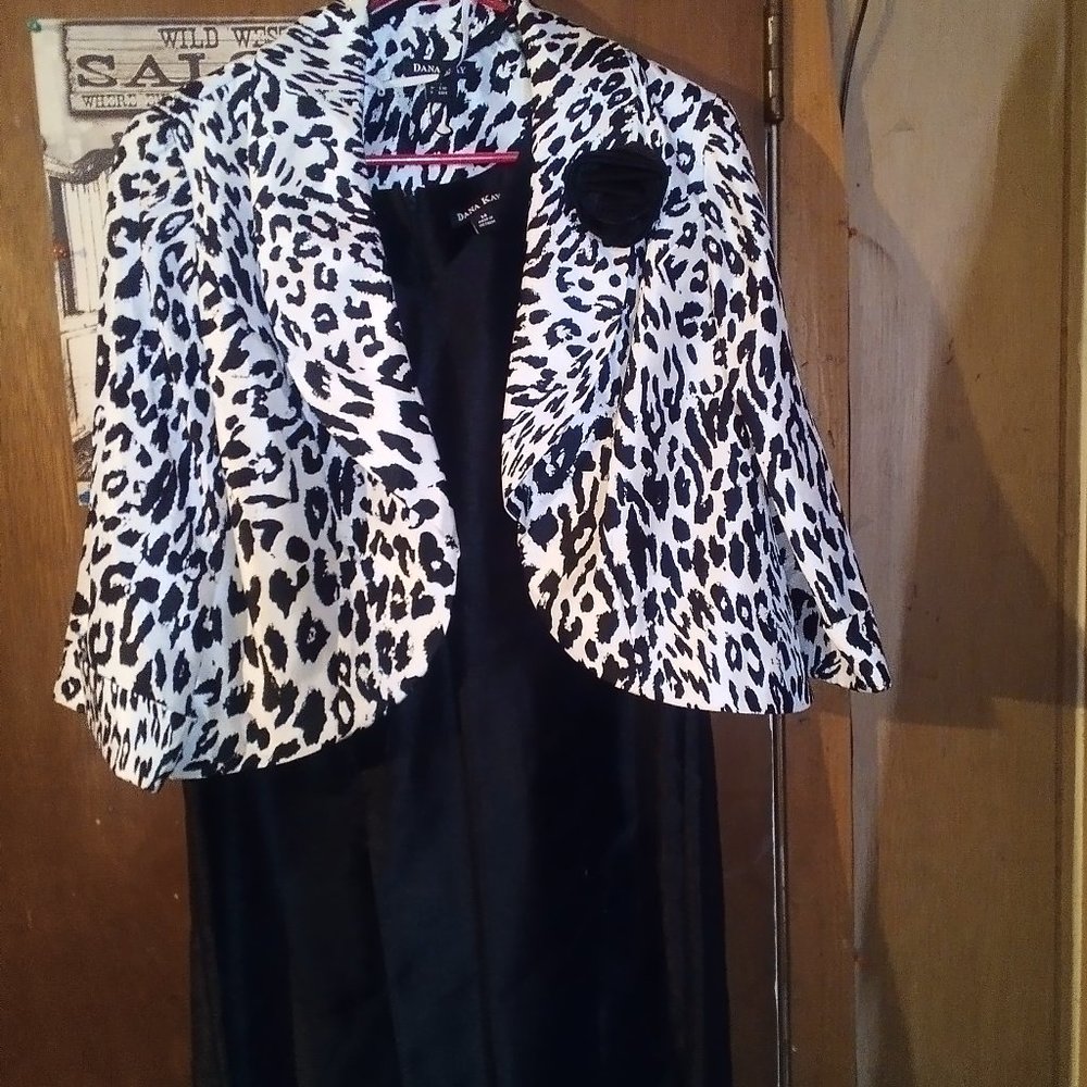 Women's black dress with white and black jacket overcoat